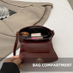 Croc Glam Shoulder Bag – This stunning bag features a luxurious croc-embossed texture and a sleek silhouette