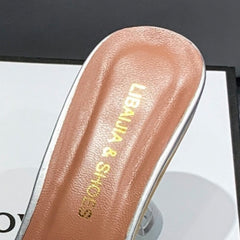 Clear Pointed-Toe Mule Heels with Rhinestone Bow