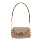 The Sleek Baguette Bag – With its refined, compact silhouette and smooth finish