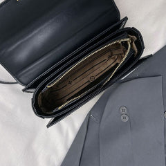 Refined Monogram-Printed Chain Sling Bag with Sleek Design and Elegant Gold Hardware