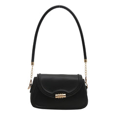 The Sleek Baguette Bag – With its refined, compact silhouette and smooth finish