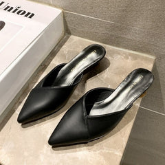 Pointed-Toe Slip-On Mules – These sleek and stylish mules feature a sharp pointed toe