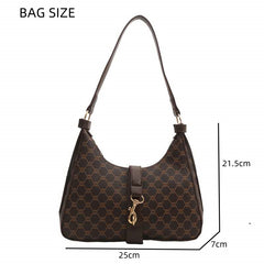 Vintage-Inspired Monogram Hobo Bag with Statement Buckle Strap and Timeless Appeal