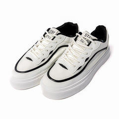 Versatile Street Sneakers in Black and White Faux Leather