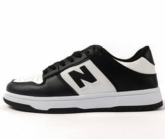 Monochrome Athletic Sneakers – Sleek, Single-Tone Footwear Designed for Everyday Performance