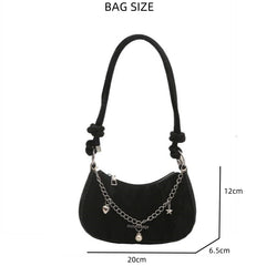 Chic Sling Bag with Chain Accents – This stylish sling bag features a sleek design adorned with elegant chain accents