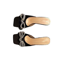 Open-Heel Heeled Sandals – Blending modern design with effortless elegance