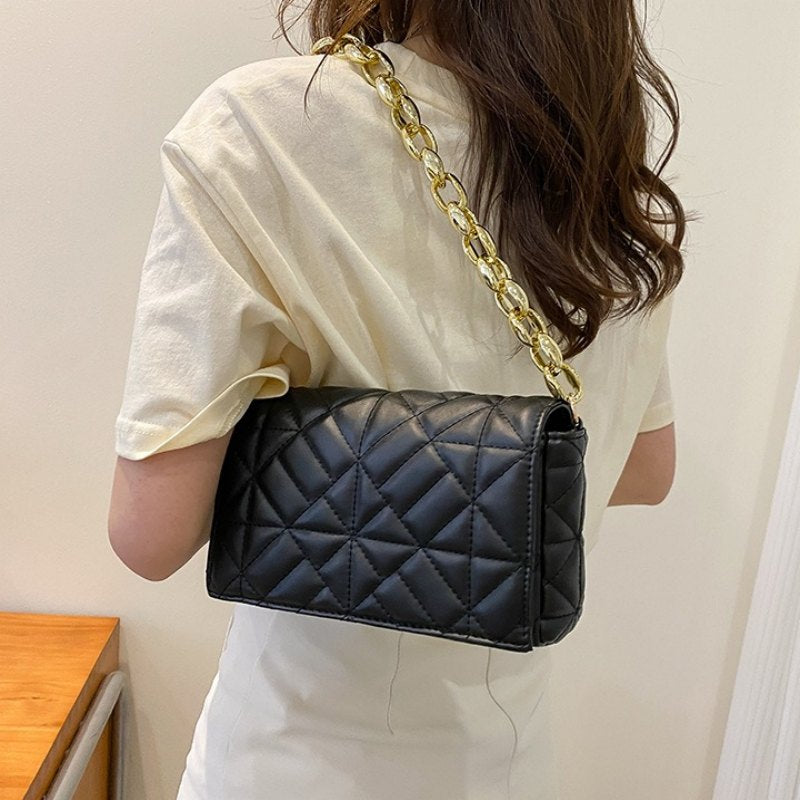 Rectangular Shaped Luxe Sling Bag – With its sleek, structured silhouette and refined finish