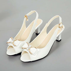 Chic Peep-Toe Heeled Mules – A modern blend of elegance and ease