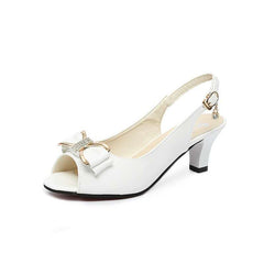Chic Peep-Toe Heeled Mules – A modern blend of elegance and ease